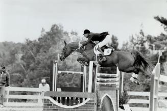 A World class mount. Horse and rider fly over a series of Jumps yesterday at the third annual Bacardi National Horse Show, which attracts top competit(...)