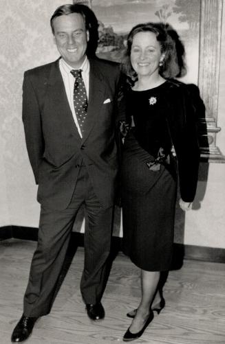 Fredrik Eaton, chairman of the Ago's Stage III Fund, with wife Nicky in wool crepe and velvet with satin bows