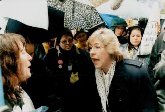 Minister Janet Ecker in a Verbal battle with a protester
