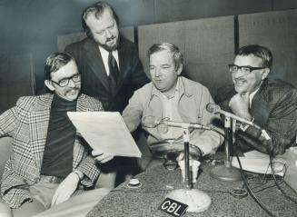 Smiling More these days is Jack Craine (with beard), head of the CBC English-language radio