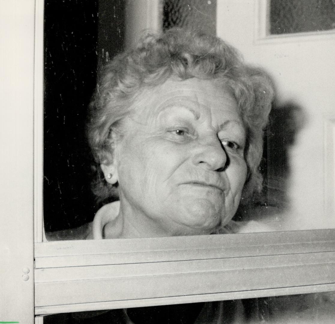 Rose Forgo: Finta's former wife, seen in photo taken through doorway