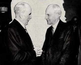 Eighty-three on Tuesday, Henry Ford, right, elder statesman of the world's automobile industry, is seen at Detroit with Charles Nash, another pioneer in motor world