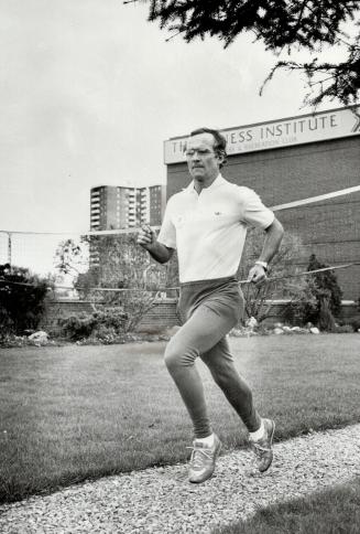 Top condition: Bill Gairdner, former decathlete and hurdles champion, is still in top form