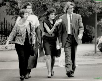 Elusive: Reporters tried in vain to pin down the politics of Richard Gere's (shown with publicist Virginia Kelly, far left, and an unidentified reporter) new film