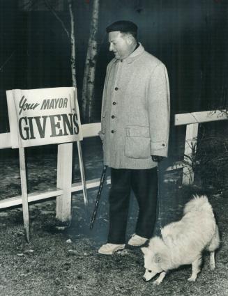 After a hard day of campaigning, Mayor Givens takeshis dog for a four-mile walk