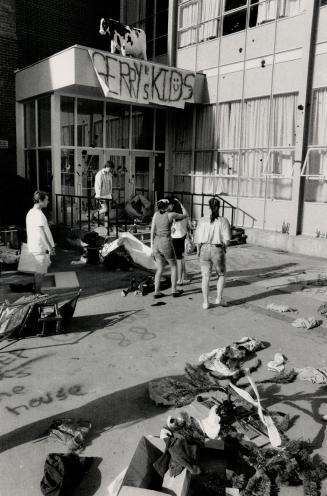 Class of '88: Students at North Toronto Collegiate Institute inspect the aftermath of last night's graduating class drunken rampage