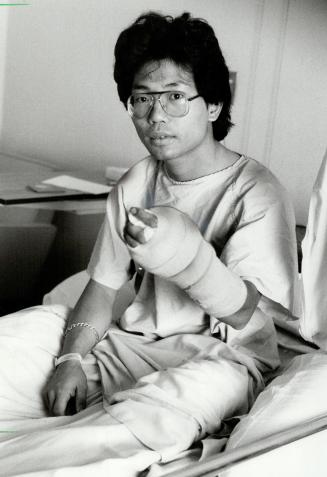 Vincent Tsui: His slashed hand still numb after two long, serious operations