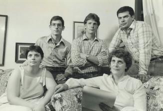 The other side: Barbara Irwin, right, with children Cathy, 23, John, 19, Stephen, 18 and Michael, 22, is the widow of Detective Michael Irwin