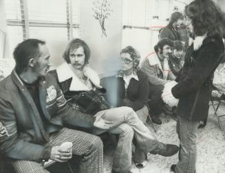 Exhausted after a long day of searching for his missing 8-year-old daughter, waiting in vain for news of her Ed Kowalski (far left) talks last night w(...)