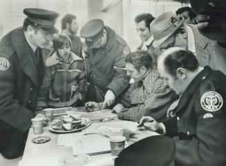 Exhausted, after a long day of searching for his missing 8-year-old daughter, waiting in vain for news of her, Ed Kowalski (far left) talks last night(...)