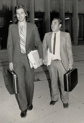 Husband seeks damages, Steven Szeman, right, who says Etobicoke General Hospital caused him to kill his wife, and son Joseph head for court in their claim for damages