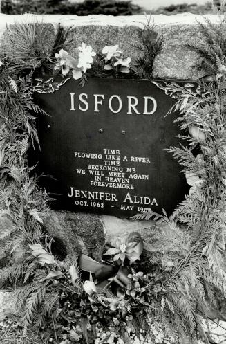 Words of love: Carved on Jenny Isford's gravestone is a verse from the song Time by The Alan Parsons Project
