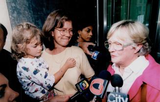 Susan Osborne (r), Pam JOhns holding Allison Blackbarn Johns
