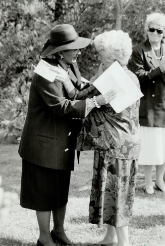 Sharing burden: Suzanne-LaPlante Edward, left, mother of Ecole Polytechnique killing victim, meets Lucette Theriault, mother of slain Ajax woman
