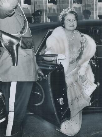 Royal sight: A Mountie held door of car as the Queen Mother alighted to attend the dinner