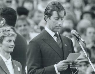 Diana attentive as her husband opens the games
