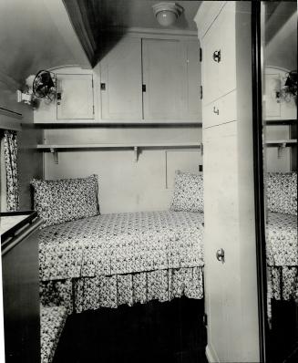 Accommodating the k. One of the bedrooms in the royal suite, Bottom Left, which will occupy the two cars last on the train, represents the final word in train accommodation. [Incomplete]
