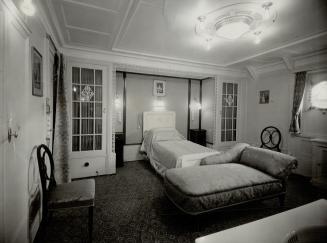 Queenly comfort - This is the tastefully appointed bedroom of the Queen's suite aboard the Empress of Australia, which is now bearing their majesties up the St. Lawrence