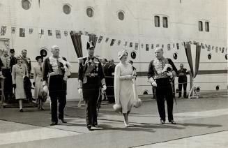 Canadians have had the opportunity of seeing the King in a wide variety of dress - naval, military, air force and mufti