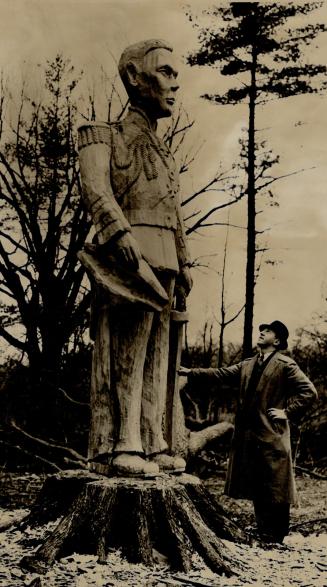The King In credit valley, A likeness of King George VI, more than life size, stands on the W
