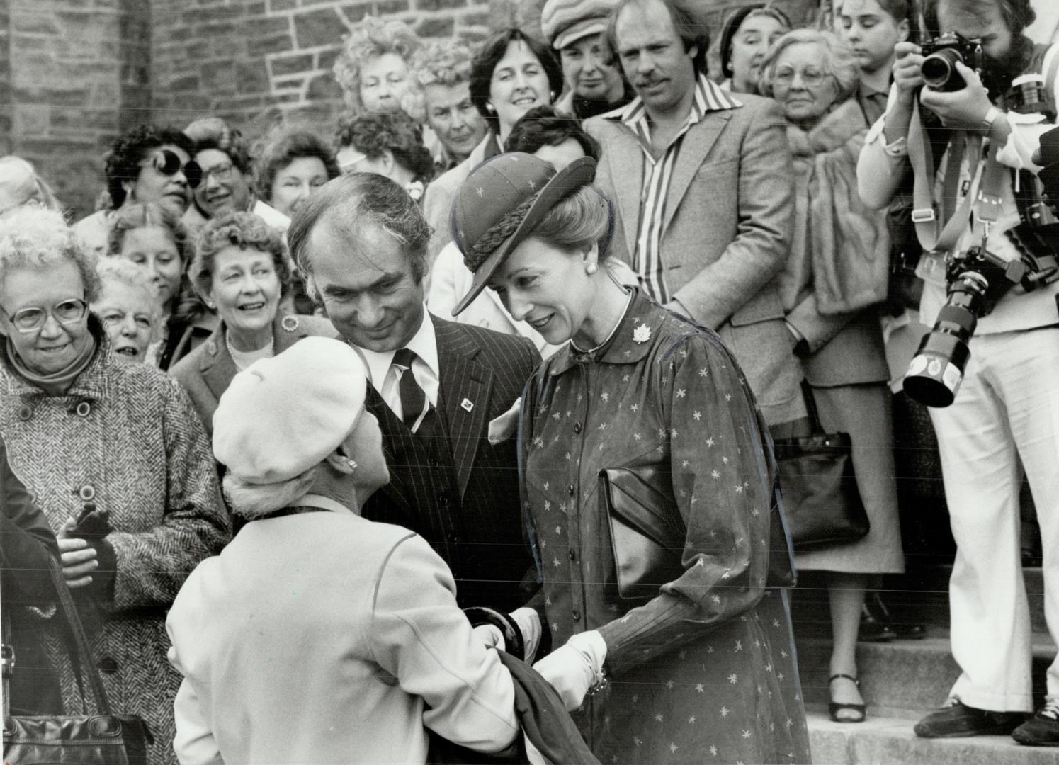 Gracious reception: Princess Alexandra, standing beside her bodyguard, Scotland Yard Inspector John Kirchin, had a warm smile and handclasp for Betty Fenson, 91, of Donmount Court yesterday