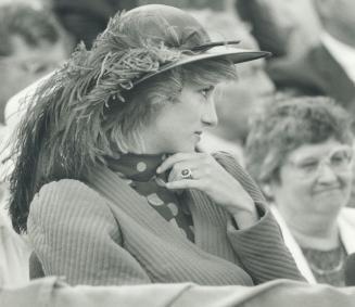 Diana attentive as her husband opens the games