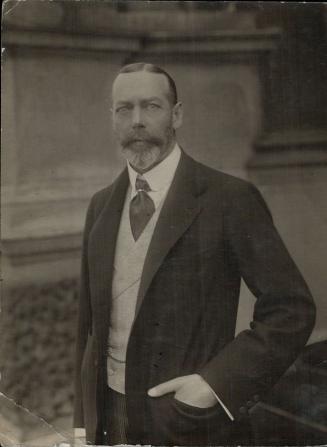 A photograph of King George in mufti