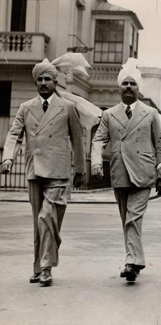Two of the King's Indian orderly officers in London for the coronation, wearing Eruropean dress except for the picturesque turbans