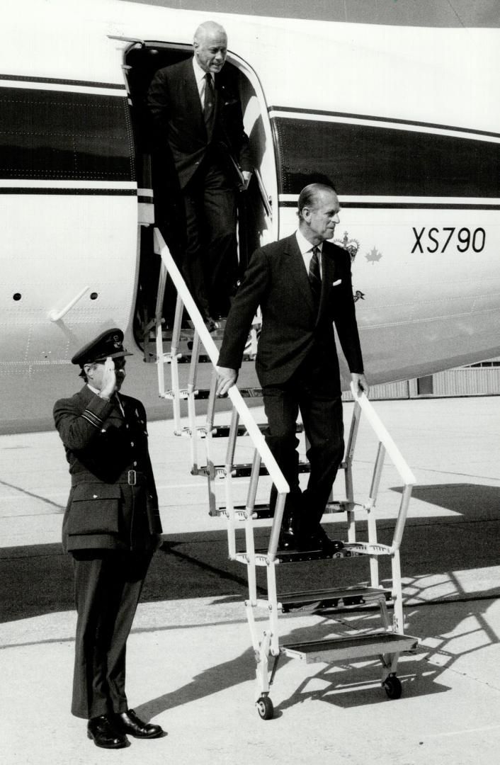 Royal landing: Prince Philip arrives at Pearson International yesterday after flying the plane from England