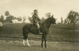 Leonard L. Youell on horseback