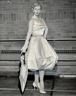 Comedienne Barbara Hamilton models a modern balloon-shaped dress