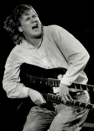 He's hot: Toronto guitarist Jeff Healey, seen in performance at Ontario Place Forum in the fall of 1988, last night snared triple honors at the CASBY Awards ceremonies