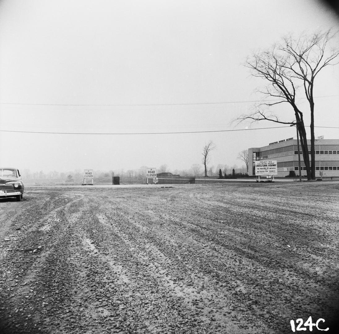 Eglinton Avenue East, looking west from east of Don Mills Road, past new office and plant of IBM on northwest corner