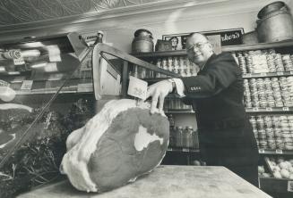 Dominion's Al Jackson saw to mock roast in their 1925 store