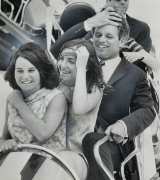 With two daughters, Senator Robert Kennedy gets look at Expo and hundreds of fair-goers took a look at them