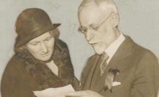 C.C.F. Leader meets woman worker. Mrs. Annie Sissons, prominent C.C.F. worker from St. Paul's riding discusses the agenda with Federal leader J. S. Wo(...)