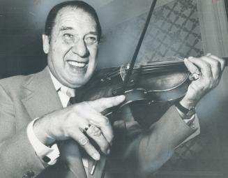 Master of the one-liners and maestro of the atrocious-fiddle-playing school, Henny Youngman yesterday dropped in on the Variety Clubs International fo(...)