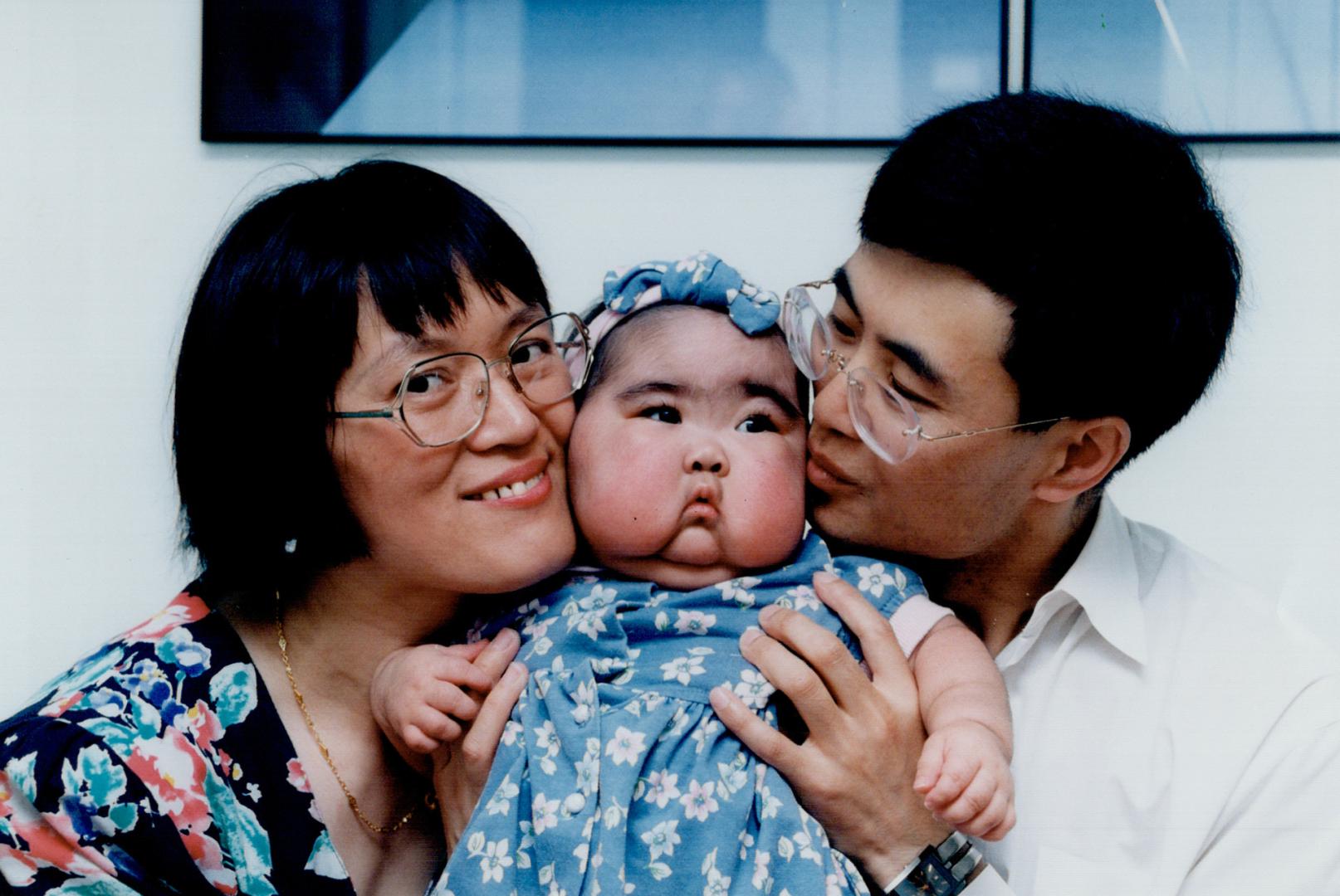 Emma Yang and parents Zhihui Ming and Dr. Jilin Yang