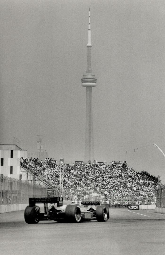 At right, packed bleachers hold some of the 61,000 fans