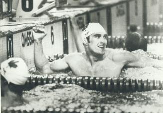 Gary Macdonald. Breaks games record, in his heat of 100 metre freestyle