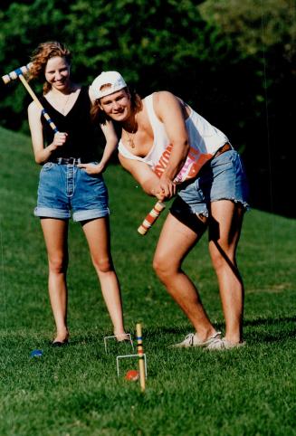 Croquet, horseshoes and badminton, or variations of these, are inexpensive, easy to learn and easy to set up within arm's reach of that cool drink in your refrigerator