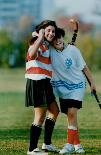 A couple of good sports. Litsa Rorris of George S. Henry Academy gets a hug from Susan Greenberg of A.Y. Jackson in a display of good sportsmanship fo(...)