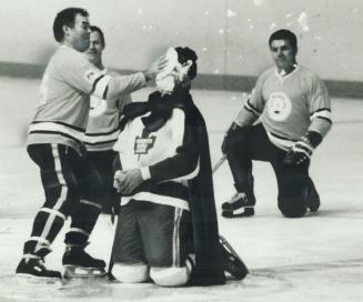 Have a pie in the eye, Former NHL great Andy Bathgate, who played with the Maple Leafs, gets a pie in the face during some of the hijinks which took p(...)