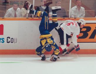 On the flip side: Sweden's Mikael Andersson was a little, um, out of position in this board bash with Team Canada's Russ Courtnall in Cup action last night