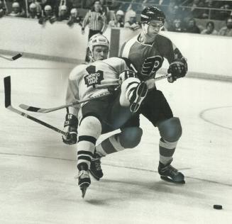 Whoops!: Philadelphia newcomer Terry Murray got the thumb for this check on Toronto center Laurie Boschman during the second period of last night's game at Maple Leaf Gardens
