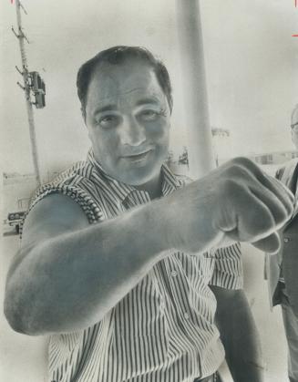 This big fist won't be seen by any ring opponent again--not for $1,500,000 let alone the $3,000,000 which former world heavyweight boxing champion Roc(...)