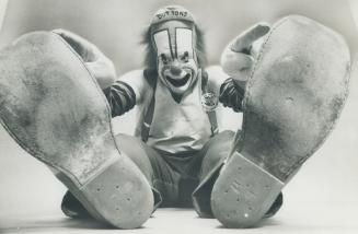 Touching his Toes is no trick at all for energetic clown