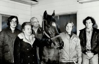 At home: With son Peter (left), husband Sam, horse Centennial, daughter Linda and son Paul