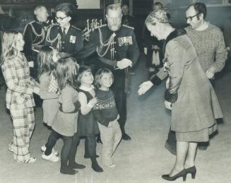 Lots of levity at the levee. At her first New Year's levee, Lieutenant-Governor Pauline McGibbon returns the smiles as she greets five of eight childr(...)