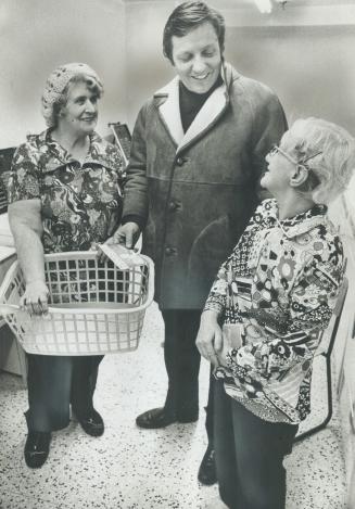 Laundry room in apartment is the scene as Roy McMurtry presents his case to Agnes McAulay and Lil O'Hara